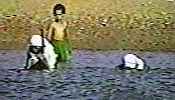Mujeres bañándose en &Aaqute;qaba